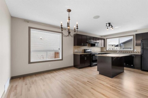 106 Luxstone Way Sw, Airdrie, AB - Indoor Photo Showing Kitchen