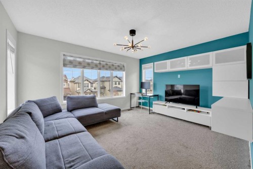 19 Bridleridge Green Sw, Calgary, AB - Indoor Photo Showing Living Room
