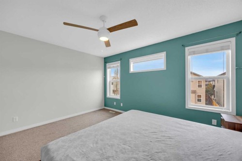 19 Bridleridge Green Sw, Calgary, AB - Indoor Photo Showing Bedroom