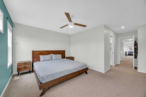 19 Bridleridge Green Sw, Calgary, AB - Indoor Photo Showing Bedroom