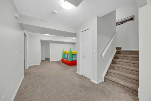 19 Bridleridge Green Sw, Calgary, AB - Indoor Photo Showing Other Room