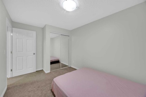 19 Bridleridge Green Sw, Calgary, AB - Indoor Photo Showing Bedroom