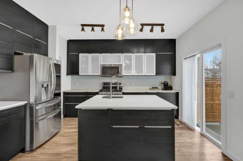 19 Bridleridge Green Sw, Calgary, AB - Indoor Photo Showing Kitchen With Upgraded Kitchen
