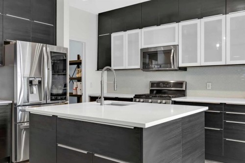 19 Bridleridge Green Sw, Calgary, AB - Indoor Photo Showing Kitchen With Stainless Steel Kitchen With Upgraded Kitchen