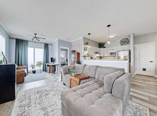104 Prestwick Gardens Se, Calgary, AB - Indoor Photo Showing Living Room