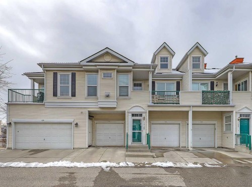 104 Prestwick Gardens Se, Calgary, AB - Outdoor With Balcony With Facade