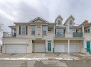 104 Prestwick Gardens Se, Calgary, AB  - Outdoor With Balcony With Facade 