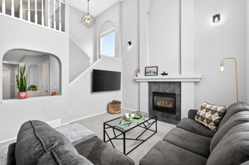 60 Citadel Ridge Close Nw, Calgary, AB - Indoor Photo Showing Living Room With Fireplace