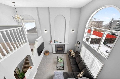 60 Citadel Ridge Close Nw, Calgary, AB - Indoor Photo Showing Other Room With Fireplace