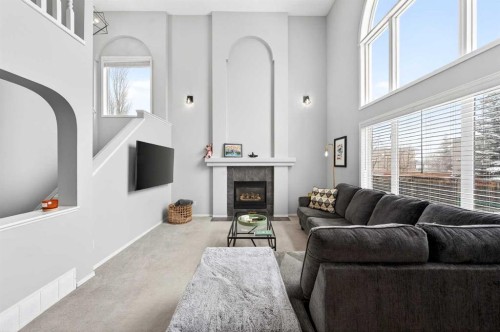 60 Citadel Ridge Close Nw, Calgary, AB - Indoor Photo Showing Living Room With Fireplace