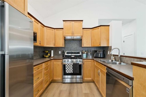 852 Everridge Drive Sw, Calgary, AB - Indoor Photo Showing Kitchen With Stainless Steel Kitchen With Double Sink