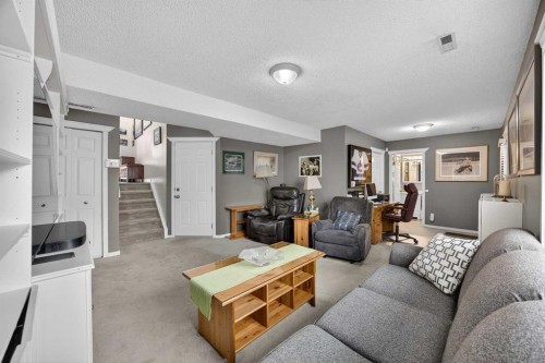 466 Douglas Glen Boulevard Se, Calgary, AB - Indoor Photo Showing Living Room