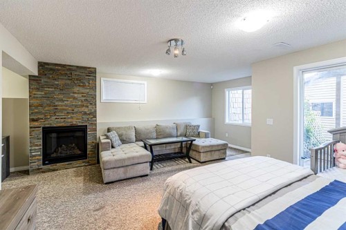 112 Covepark Rise Ne, Calgary, AB - Indoor With Fireplace