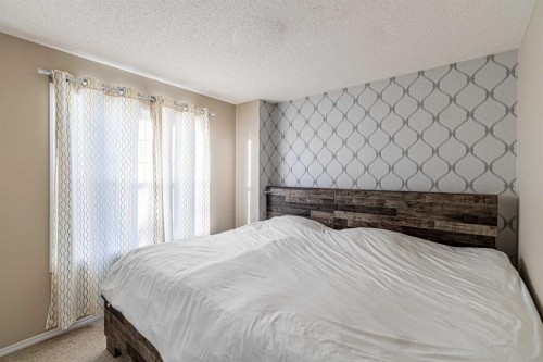 112 Covepark Rise Ne, Calgary, AB - Indoor Photo Showing Bedroom