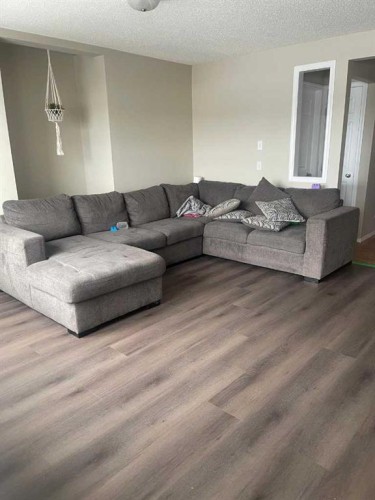 112 Covepark Rise Ne, Calgary, AB - Indoor Photo Showing Living Room
