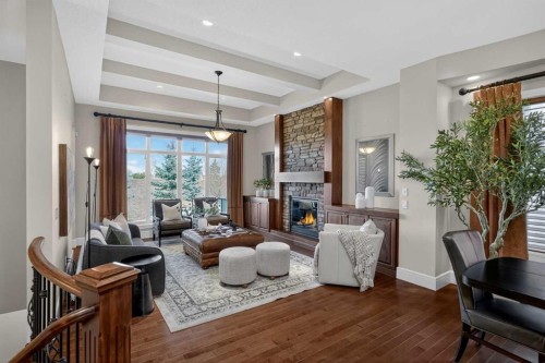 125 Artesia Gate, Heritage Pointe, AB - Indoor Photo Showing Living Room With Fireplace
