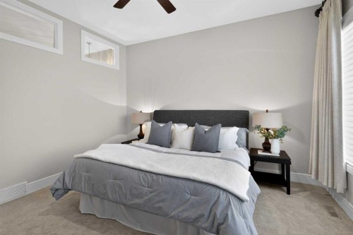 125 Artesia Gate, Heritage Pointe, AB - Indoor Photo Showing Bedroom