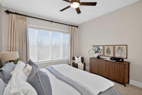 125 Artesia Gate, Heritage Pointe, AB - Indoor Photo Showing Bedroom