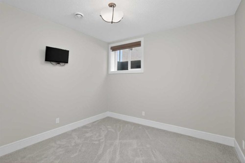 125 Artesia Gate, Heritage Pointe, AB - Indoor Photo Showing Other Room
