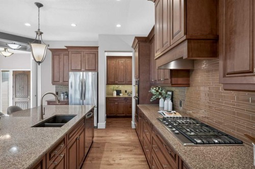 125 Artesia Gate, Heritage Pointe, AB - Indoor Photo Showing Kitchen With Double Sink With Upgraded Kitchen