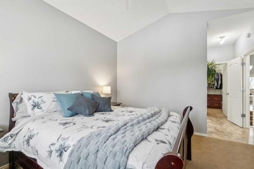 328 Cove Road, Chestermere, AB - Indoor Photo Showing Bedroom