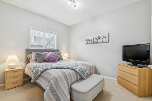 328 Cove Road, Chestermere, AB - Indoor Photo Showing Bedroom