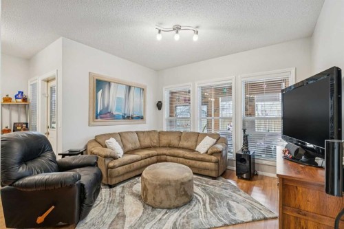 328 Cove Road, Chestermere, AB - Indoor Photo Showing Living Room