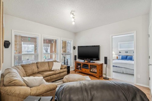 328 Cove Road, Chestermere, AB - Indoor Photo Showing Living Room