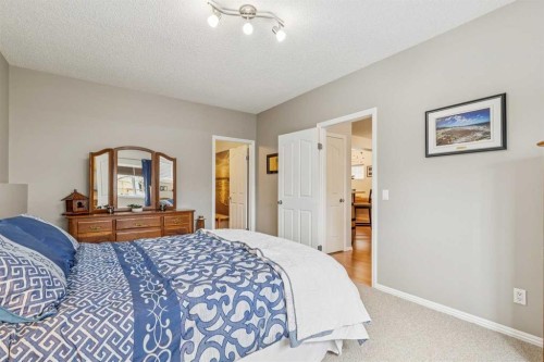 328 Cove Road, Chestermere, AB - Indoor Photo Showing Bedroom