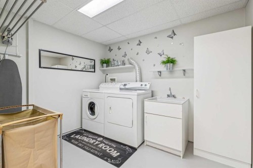 328 Cove Road, Chestermere, AB - Indoor Photo Showing Laundry Room