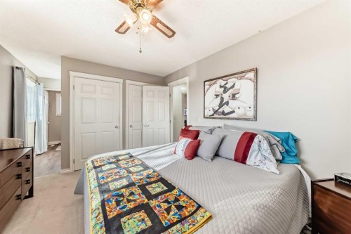 8 Meadow Place Se, Airdrie, AB - Indoor Photo Showing Bedroom