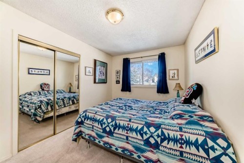 8 Meadow Place Se, Airdrie, AB - Indoor Photo Showing Bedroom