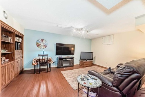 8 Meadow Place Se, Airdrie, AB - Indoor Photo Showing Living Room