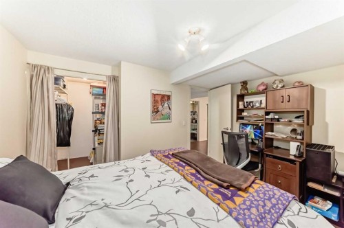 8 Meadow Place Se, Airdrie, AB - Indoor Photo Showing Bedroom