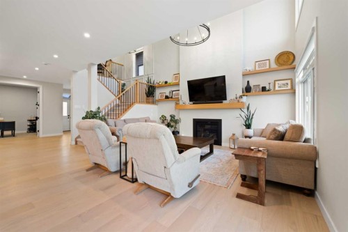224 South Shore View, Chestermere, AB - Indoor Photo Showing Living Room With Fireplace