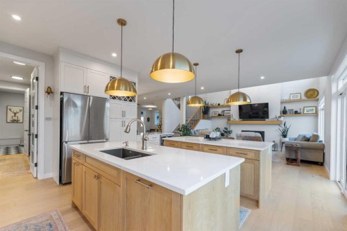 224 South Shore View, Chestermere, AB - Indoor Photo Showing Kitchen With Double Sink