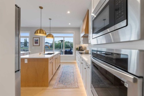 224 South Shore View, Chestermere, AB - Indoor Photo Showing Kitchen With Upgraded Kitchen