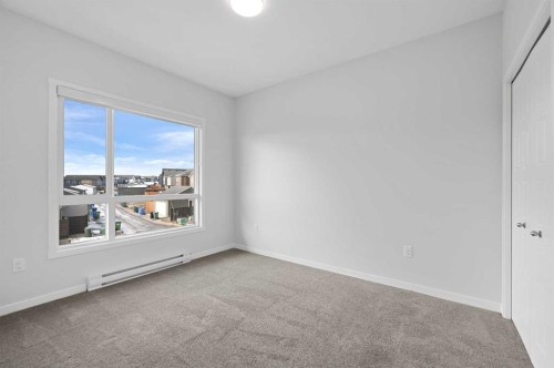 3205-220 Seton Grove Se, Calgary, AB - Indoor Photo Showing Other Room
