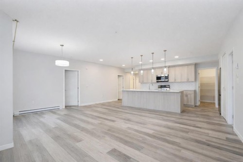 3205-220 Seton Grove Se, Calgary, AB - Indoor Photo Showing Kitchen