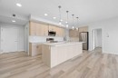 3205-220 Seton Grove Se, Calgary, AB  - Indoor Photo Showing Kitchen With Upgraded Kitchen 