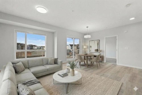 3205-220 Seton Grove Se, Calgary, AB - Indoor Photo Showing Living Room