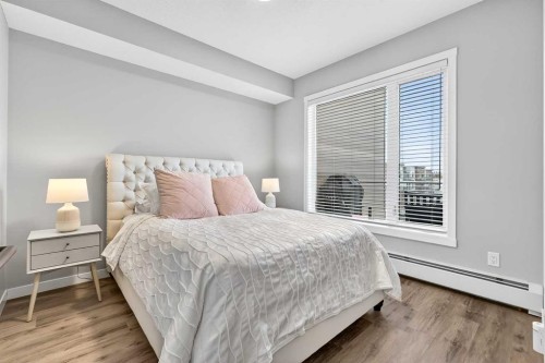 401-150 Shawnee Square Sw, Calgary, AB - Indoor Photo Showing Bedroom