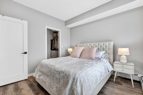 401-150 Shawnee Square Sw, Calgary, AB - Indoor Photo Showing Bedroom