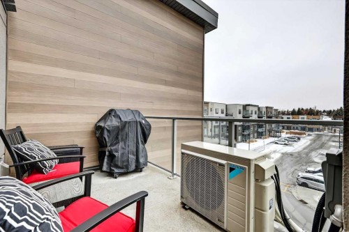 401-150 Shawnee Square Sw, Calgary, AB - Outdoor With Balcony With Exterior
