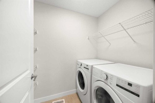 507 Lucas Boulevard Nw, Calgary, AB - Indoor Photo Showing Laundry Room