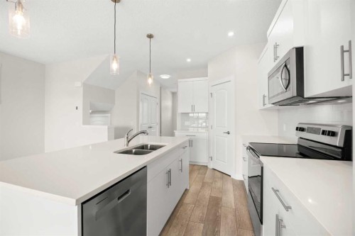 507 Lucas Boulevard Nw, Calgary, AB - Indoor Photo Showing Kitchen With Double Sink With Upgraded Kitchen