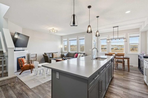 57 Crestridge Bay Sw, Calgary, AB - Indoor Photo Showing Kitchen With Double Sink With Upgraded Kitchen