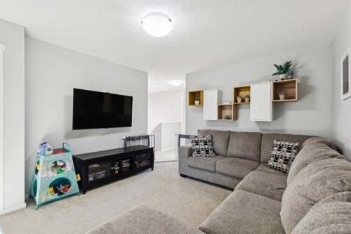 57 Crestridge Bay Sw, Calgary, AB - Indoor Photo Showing Living Room