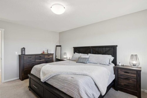 57 Crestridge Bay Sw, Calgary, AB - Indoor Photo Showing Bedroom