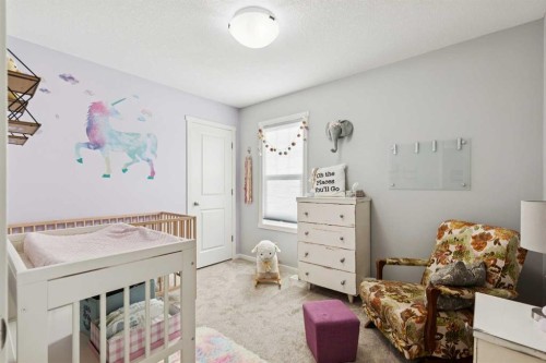 57 Crestridge Bay Sw, Calgary, AB - Indoor Photo Showing Bedroom
